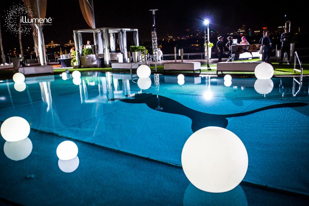 Brand activation lighting pool glowing spheres Miami
