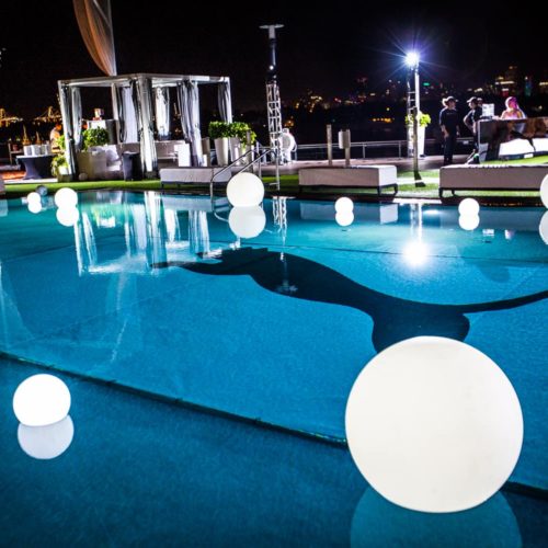 Brand activation lighting pool glowing spheres Miami