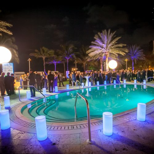 Airstars and large wax luminaries for a corporate event Miami