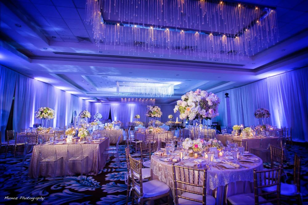 Fontainebleau wedding blue uplighting and draping
