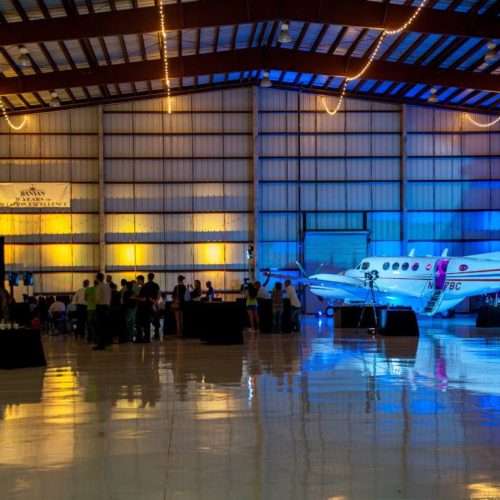 Plane hangar uplighting event production lighting Miami