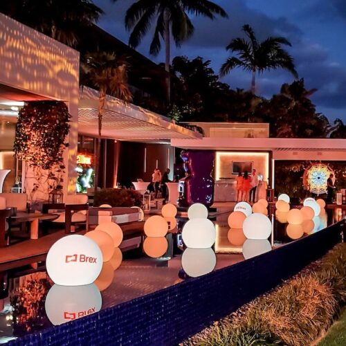 rent LED branded glow spheres balls Miami floating globes corporate party
