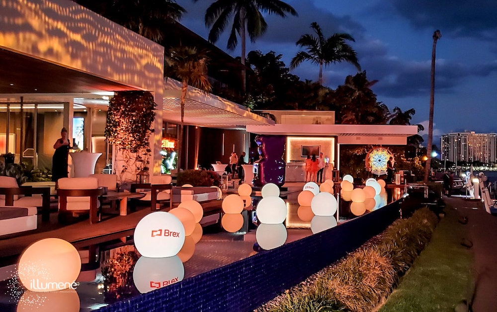 rent LED branded glow spheres balls Miami floating globes orbs corporate party brand activation