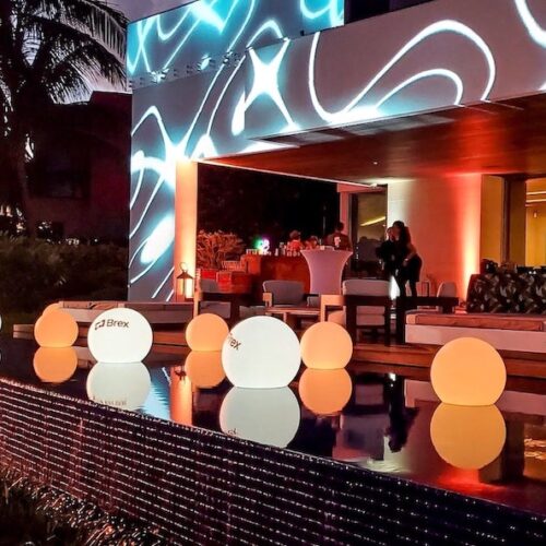 rent LED glow spheres balls Miami floating globes corporate event