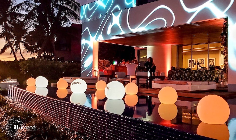 rent LED glow spheres balls Miami floating globes corporate event