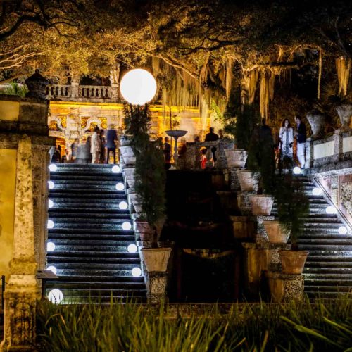 Vizcaya corporate event lighting Miami airstars moon balloon LED glow spheres on stairs to the Mound